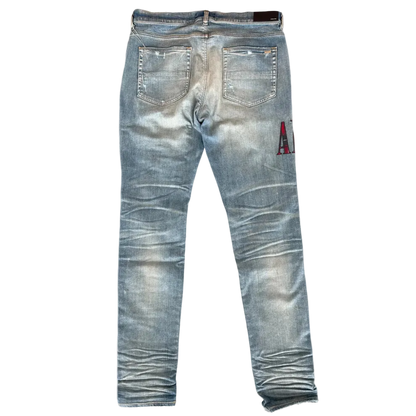 Amiri Clay Indigo Red Flannel Core Applique Logo Jeans